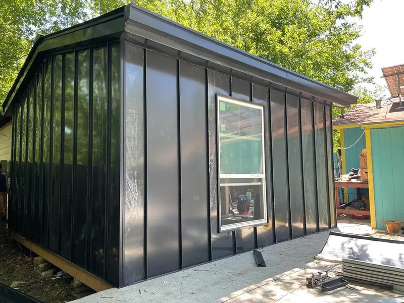 Black standing seam metal wall panels for Roof Inspection in Asheboro