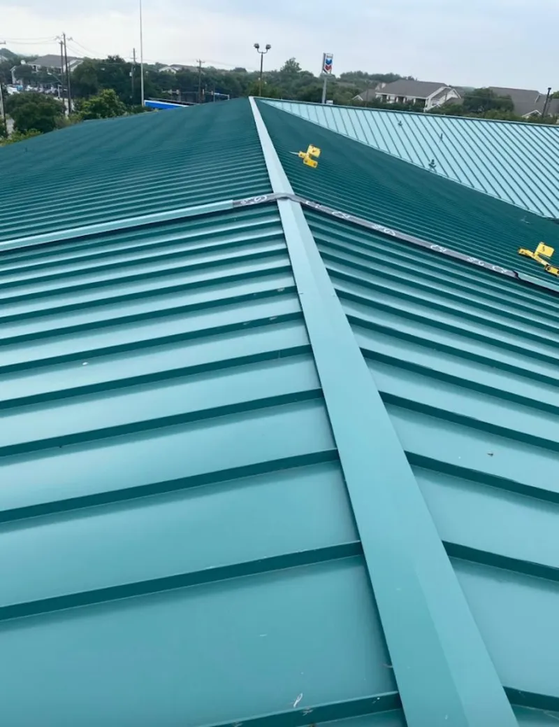 Green commercial metal roof ridge and valley for Metal Roof Repair in Asheboro
